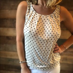 White blouse black polka dots